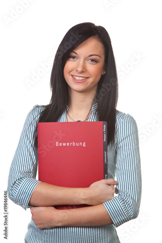 Photo: Woman with Application folder for the interview Woman with Application folder for the interview