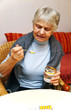 Photo: Senior taking bitter Medicine - Seniorin Tabletten Einnahme Senior taking bitter Medicine - Seniorin Tabletten Einnahme