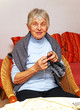 Photo: Happy Senior at Home - Seniorin beim Stricken Happy Senior at Home - Seniorin beim Stricken