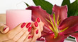 Beautiful manicure, lily and candle