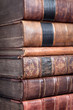 Photo: Pile of old leather bound books Pile of old leather bound books