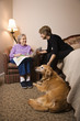 Photo: Elderly Woman With Younger Woman and Dog Elderly Woman With Younger Woman and Dog