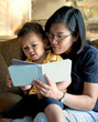 Mother Reading to Little Boy