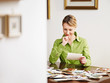 Photo: woman looking at photos woman looking at photos
