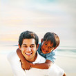 Happy Father and Son at the Beach