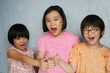 Kids with thumbs up