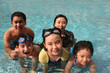 Happy family in the pool