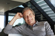 Mature man in his house
