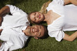 Foto: Young couple on the grass Young couple on the grass