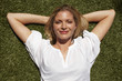 Girl lying on the grass