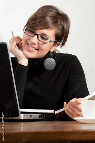 Photo: business woman with laptop business woman with laptop