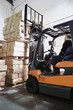 Forklift loader in warehouse