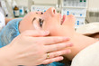 Girl getting face massage.