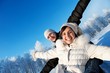 Happy smiling couple on a winter background