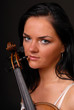 beautiful girl paying the violin