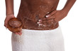 Photo: Exfoliation Woman Putting scrub on abdomen Exfoliation Woman Putting scrub on abdomen