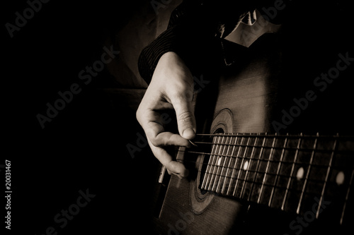 Photo: guitar at black background guitar at black background