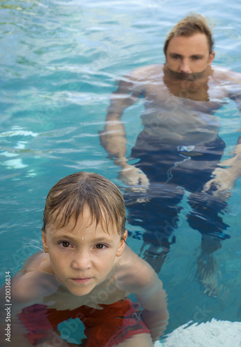 Photo: Father and son in the water Father and son in the water