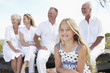 Girl with her parents and grandparents