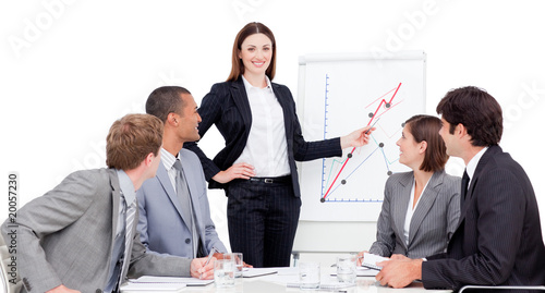 Photo: Confident businesswoman giving a presentation Confident businesswoman giving a presentation