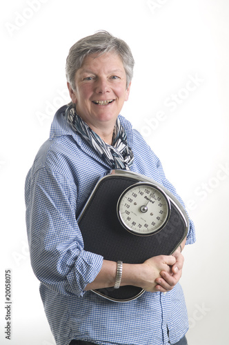 Photo: Women with scale Women with scale
