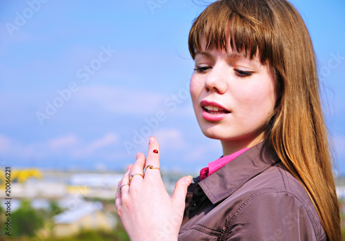 Photo: girl and ladybird girl and ladybird