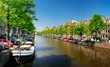 Sunny spring day. Canal Amsterdam Sunny spring day. Canal Amsterdam