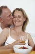 Man kisses his wife