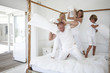 Family pillow fighting