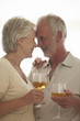 Mature couple drinking wine