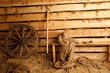 Interior of village building: wheel, pitchfork, bench... Interior of village building: wheel, pitchfork, bench...