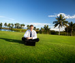 happy young businessman and sunset