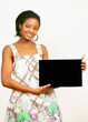 Smiling girl with black message board
