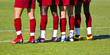 Soccer players waiting the ball