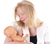 Teenager with plastic doll