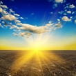 magestic sunset above a plough-land magestic sunset above a plough-land