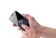 Photo: Hand with black cellphone Hand with black cellphone