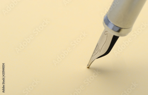 Photo: Silver fountain pen closeup Silver fountain pen closeup