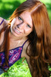 beautiful young woman in summer park