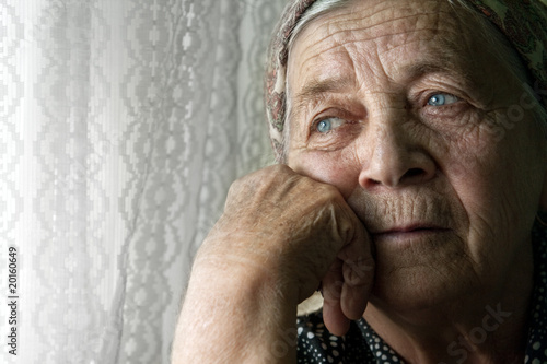 Photo: Sad lonely pensive old senior woman Sad lonely pensive old senior woman