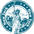 Grunge rubber stamp with the Statue of Liberty