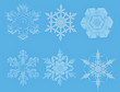Lite Blue Snowflakes on blue background