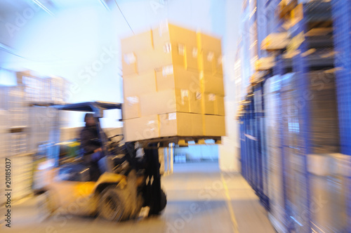 Photo: loader in a warehouse loader in a warehouse