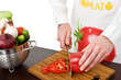 Male chef cutting vegetables Male chef cutting vegetables
