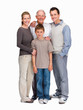 Family of four standing together against white