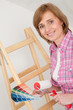 Woman choose the color of wall