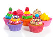 beautiful colored cupcakes isolated on white beautiful colored cupcakes isolated on white
