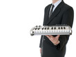 BUSINESSMAN MUSICIAN WITH INSTRUMENT WITH SUIT