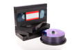 Photo en ligne au meilleur prix Old Video Cassette tapes with DVD discs isolated