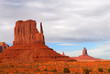 The Mittens in Monument Valley under a stormy sky